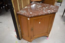 A Victorian satinwood corner washstand having rouge marble top, width approx. 80cm