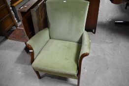 A vintage Parker Knoll easy chair having green dralon upholstery, width approx. 68cm
