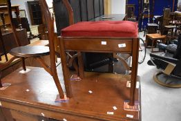 A moder/vintage mahogany dressing table or piano stool