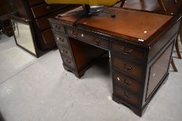 A reproduction Regency pedestal desk, approx width 122cm