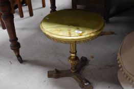A vintage onyx occasional table on brass frame, diameter approx. 37cm