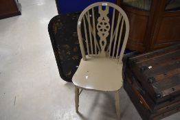 A traditional painted ladderback kitchen chair