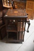 An Edwardian mahogany revolving bookcase, approx. 46 x 46 x 82cm