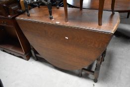 An early 20th Century oval twist gateleg table, width approx. 120cm