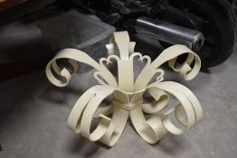 A glass top circular coffee table having metal base, diameter approx. 99cm