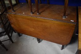 A 19th Century mahogany drop leaf dining table, width approx. 129cm, closed depth 53cm