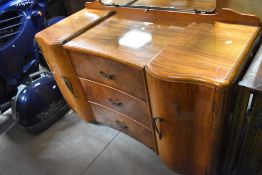 An early to mid 20th Century walnut dressing table, width approx. 120cm