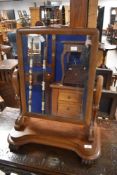 A Victorian , mahogany toilet mirror having scroll feet, width approx. 55cm