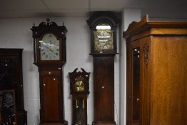 A 19th Century mahogany long cased clock having eight day movement with brass and silvered dial