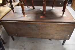 A 19th Century dark stained frame , having single drop leaf, width approx. 142 x 73cm
