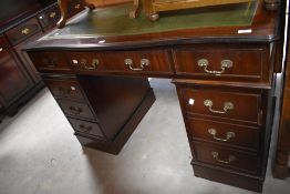 A reproduction Regency pedestal desk, width approx. 122cm