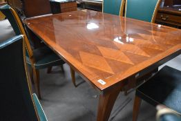 A vintage French cherry/walnut wood dining table, having diamond pattern to top , in the style of