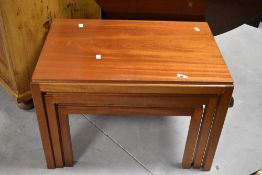 A vintage Gordon Russell nest of three tables, width approx. 68cm