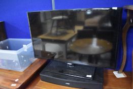 A Samsung 32inch flat screen TV and Bose TV speaker etc