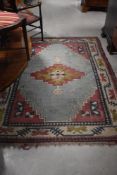 A traditional Turkish style wool rug, approx. 185 x 140cm
