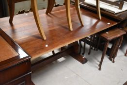 A composite dining table , approx 85 x 140cm