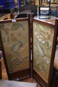 A late 19th or early 20th Century mahogany framed firescreen having embroidered panel inset,height