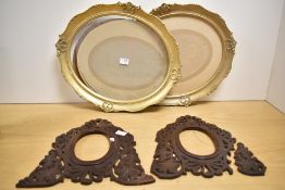 A pair of oval gilt picture frames 37cm x 32 although only one has glass, sold along with a pair