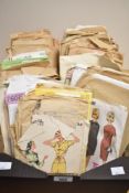 A carton of assorted vintage sewing patterns to include Weldons, Womans Weekly, Simplicity and