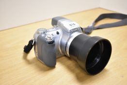 A Sony Cyber-Shot DSC-H2 digital camera, released 2006, having original box, (1), condition