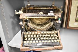 An early 20th-century American Underwood typewriter, 30cm, sold as is with condition consistent with