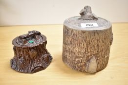 Two late 20th-century tobacco jars, both featuring a log finial and tree stump textured design, both