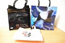 Three y2k shopping totes, including a 2000s Ted Baker example, another Ted Baker, black with gold