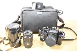 A Zenit 11 35mm SLR camera with a Helios 44 58mm f2 lens. Sold alongside a Soviet Jupiter-IIA 4/