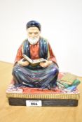 A Reg Johnson (Formerly of Royal Doulton) studio pottery figure 'Tunisian Scholar of Law' figure