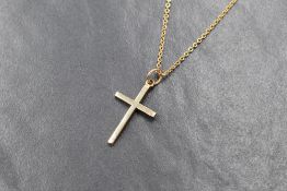 A 9ct gold cross pendant of plain form on a 16' 9ct gold chain, approx 2.9g