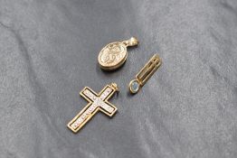 A yellow metal presumed gold geometric blue topaz set pendant, of rectangular form having a round