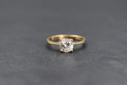 A 9ct gold cubic zirconia set solitaire ring, the round brilliant cut cubic zirconia measuring