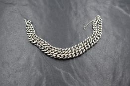 An HM silver double row graduated curb link bracelet, missing padlock clasp, approx 165mm long &