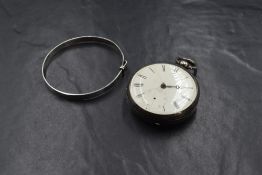 A William IV silver open face key wound pocket watch, the cream dial having Roman numerals and