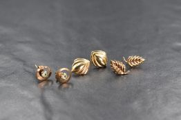 Three pairs of 9ct gold earrings of various designs for pierced ears, approx 2.2g