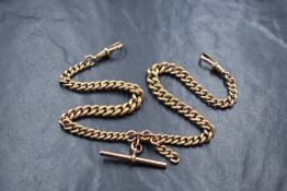 A 9ct gold curb link Albert watch chain, the graduated links having a T-bar and additional chain
