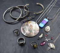 A small selection of silver and white metal jewellery stamped 925 including bangle, rings,