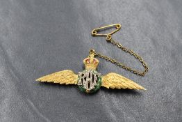 A yellow metal RAF sweetheart brooch having red and green enamel and diamond chip decoration,