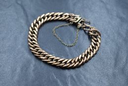 A 9ct rose gold curb link bracelet, having a box clasp, marked 375, 11.9g