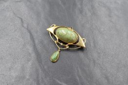 A 15ct gold Art Nouveau Murrle Bennett & Co. turquoise and seed pearl set brooch, the sinuous