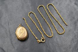 A 9ct gold broken rope chain, marked 375, 5.1g, along with a 9ct gold front and back locket, of oval
