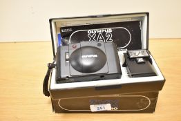 Olympus XA2 in original packaging and with instructions and an A11 Electronic Flash attachment. An
