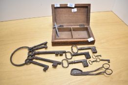 A selection of 19th and 20th-century wrought iron keys, to include three 'kidney-bow' top key