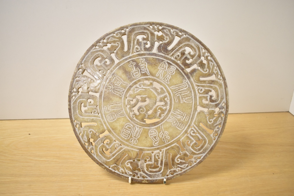 A decorative Chinese carved and pierced black stone Bi/Yubi type disc/carving, of circular form with - Image 2 of 2
