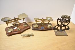 Two 19th to early 20th-century brass and wood postage scales, including a William and Thomas Avery
