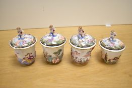 A quantity of 20th-century Italian Capodimonte miniature porcelain teacups, having relief designs,
