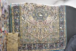 Thought to be 20th-century Persian silk-style rug, the blue ground finely hand-knotted with
