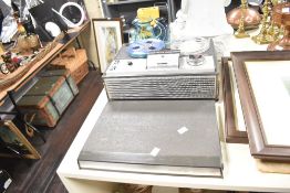 A vintage German Grundig TK 140 de Luxe reel-to-reel tape recorder, featuring a quarter-track mono