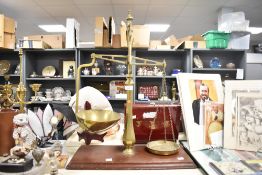 A large 19th/20th-century brass Apothecary scale, upon a wooden base, unmarked, 70cm tall, condition