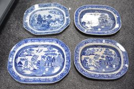 A selection of 19th-century of blue and white stoneware serving platters, to include